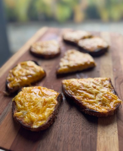 Slices of bread with toasted cheese